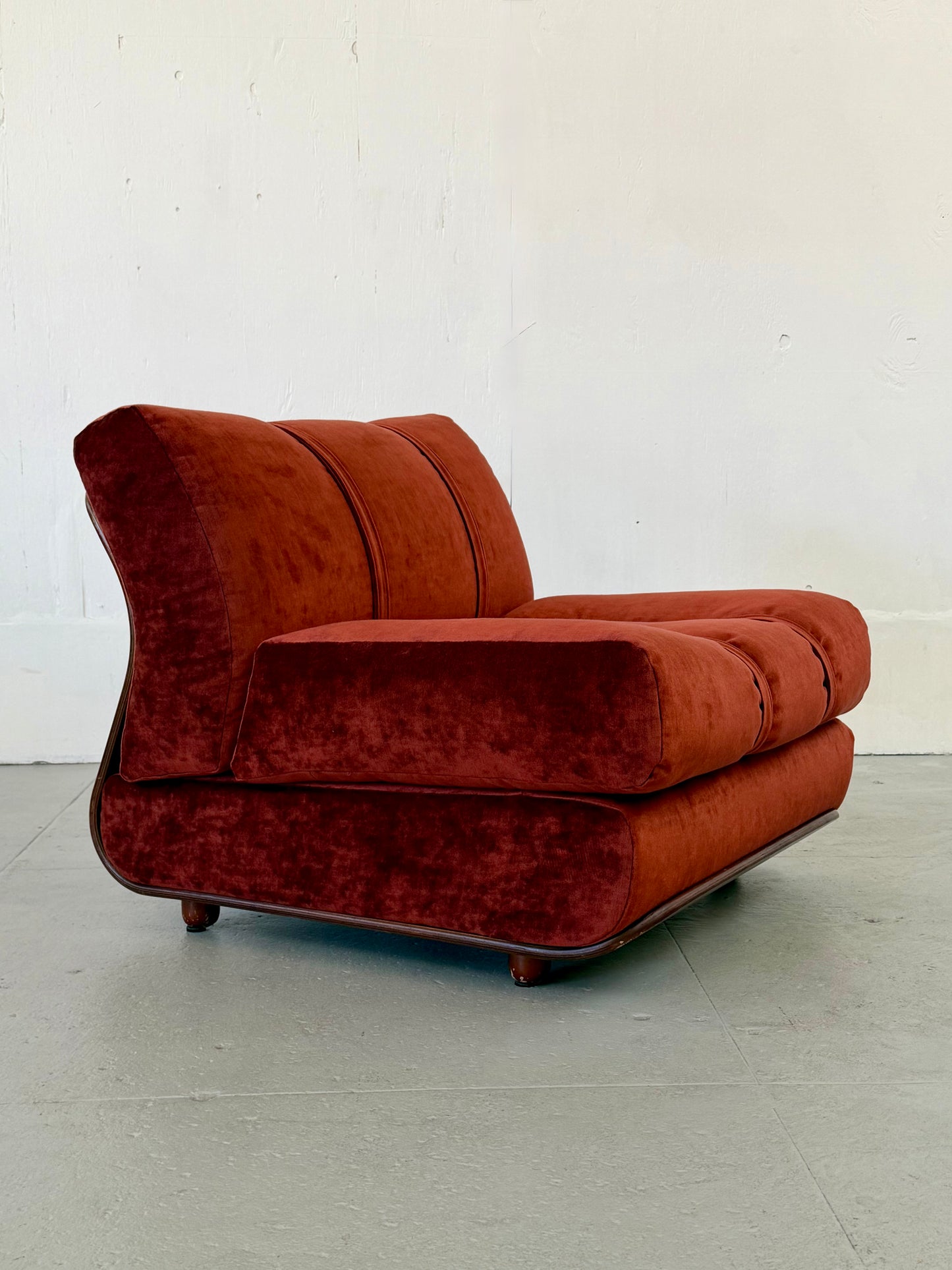 Walnut bentwood lounge chair upholstered in maroon Maharam velvet, front view